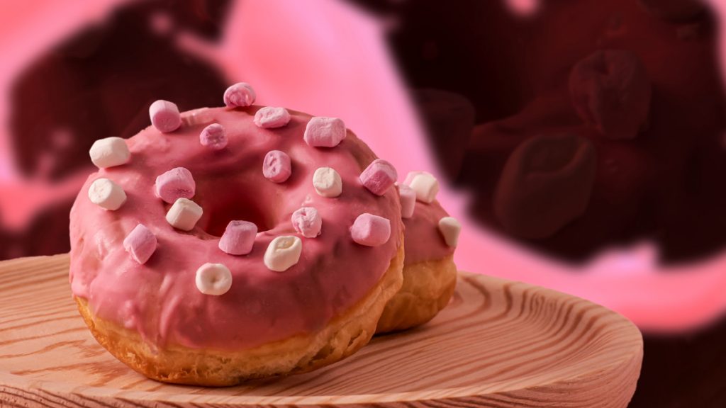 Donut glaseado rosa en fotografía gastronómica Valencia.